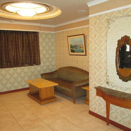 Huangjia Motel Tajnan Kültér fotó