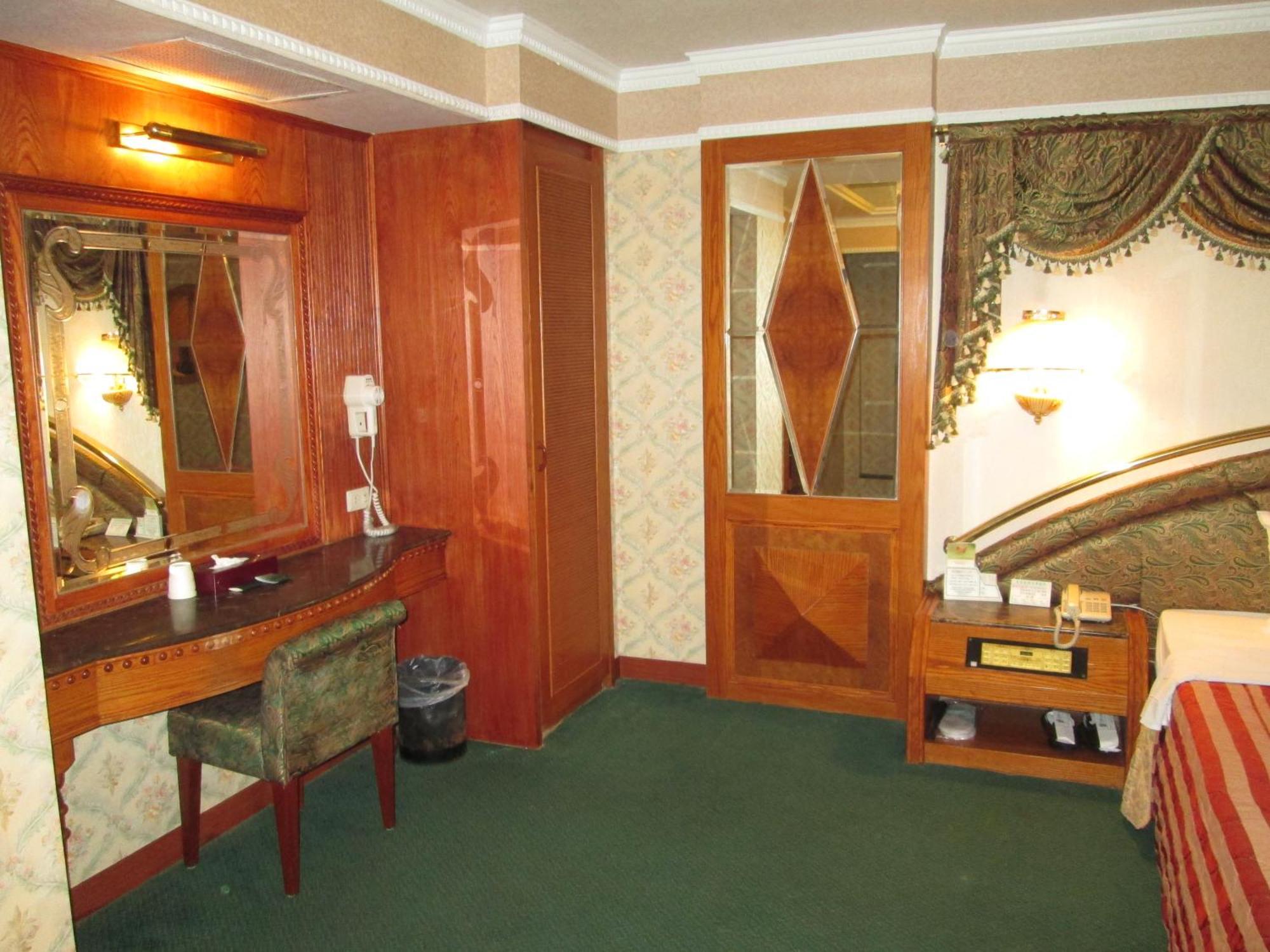 Huangjia Motel Tajnan Kültér fotó