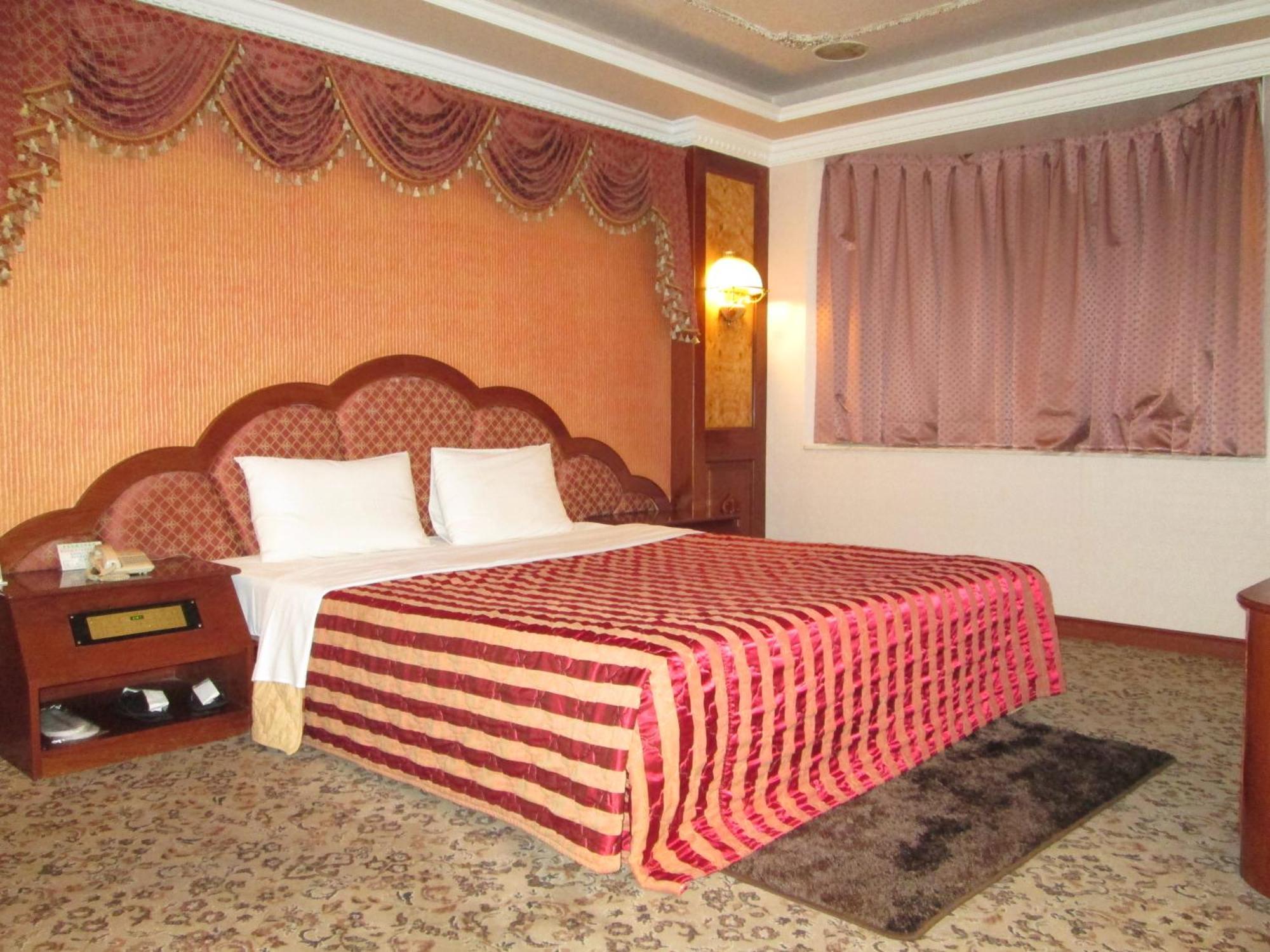 Huangjia Motel Tajnan Kültér fotó