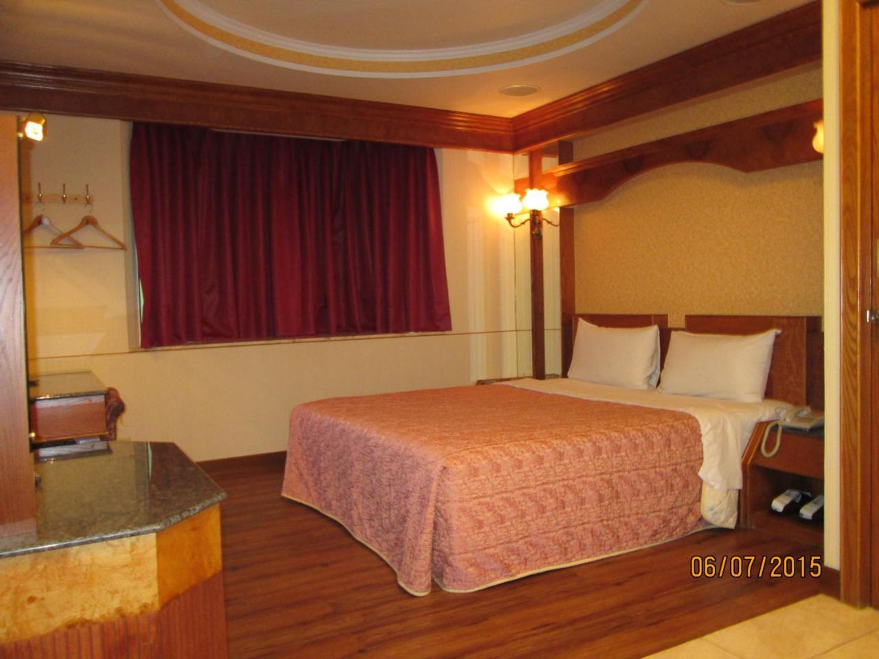 Huangjia Motel Tajnan Kültér fotó